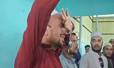 হাতকড়া পরে বাবার জানাজায় আ. লীগ নেতা